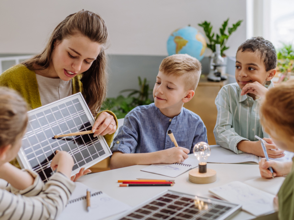 Kids and teacher in classroom